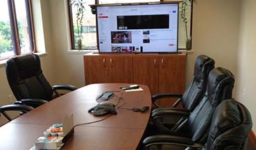 369-Videoconference-Setup-with-Custom-Cabinet-Motorized-TV-Lift-Hidden-Equipment-in-Boulder
